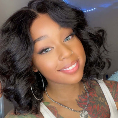 Woman with curly hair wearing a lace wig, showcasing a natural look and 150% density hairstyle.